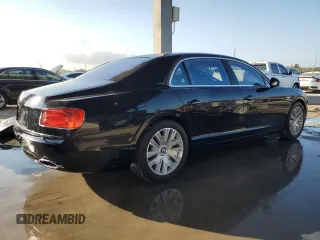 2014 Bentley Flying Spur z VIN SCBEC9ZA2EC090466, wystawiony jako Copart lot #43833305 z przebiegiem 53 837 mil mil oraz Szkody całkowita. Historia ofert i sprzedaży dostępna na DreamBid. Obrazek 3.