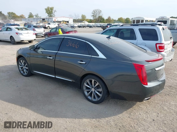 2013 Cadillac XTS Luxury with VIN 2G61P5S3XD9228218, listed as a IAAI auction lot 40503666 with 87,857 mi miles. Bid and sale history available at carsss.com. Image 3.
