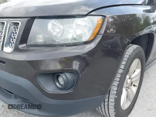 2014 Jeep Compass Latitude with VIN 1C4NJDEBXED622352, listed as a IAAI auction lot 42130403 with 149,024 mi miles. Bid and sale history available at carsss.com. Image 16.