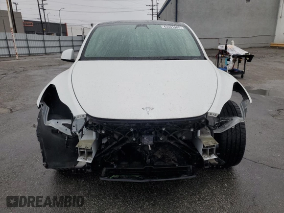 2020 Tesla Model Y Long Range with VIN 5YJYGDEE5LF053938, listed as a Copart auction lot 43381985 with 69,291 mi miles and Salvage Title. Bid and sale history available at DreamBid. Image 5.