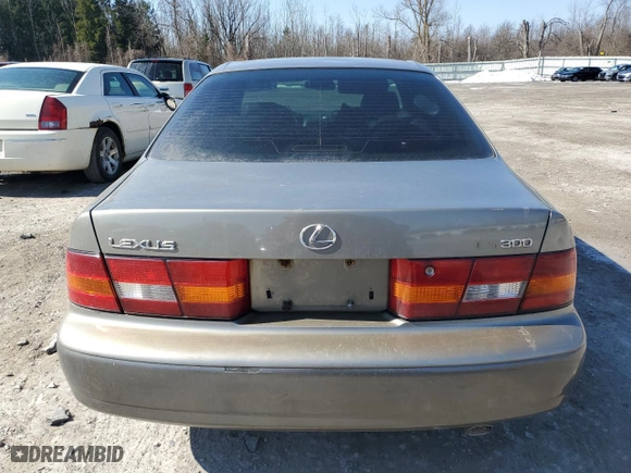 1997 Lexus ES 300 Luxury Sport Sdn with VIN JT8BF22G5V0068099, listed as a Copart auction lot 48546785 with 239,583 mi miles and Salvage Title. Bid and sale history available at carsss.com. Image 6.