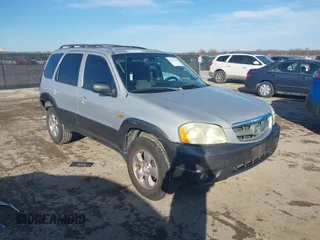 2003 Mazda Tribute LX with VIN 4F2YZ04183KM44733, listed as a IAAI auction lot 41472662 with 246,522 mi miles and . Bid and sale history available at carsss.com. Image 1.