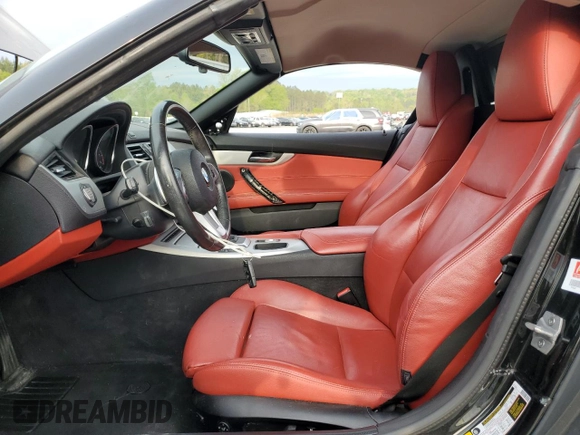 2016 BMW Z4 sDrive28i with VIN WBALL5C50GP557837, listed as a Copart auction lot 51038615 with 59,878 mi miles and Salvage Title. Bid and sale history available at carsss.com. Image 7.