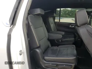 2023 Chevrolet Suburban Premier z VIN 1GNSCFKD0PR504435, wystawiony jako Copart lot #60309665 z przebiegiem 50 744 mil mil oraz Czysty tytuł • Clean title. Historia ofert i sprzedaży dostępna na DreamBid. Obrazek 11.