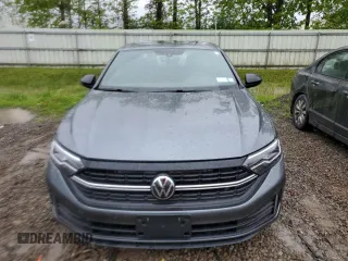 2023 Volkswagen Jetta Sport with VIN 3VWBM7BU8PM047576, listed as a Copart auction lot 57464945 with 38,214 mi miles and Salvage title. Bid and sale history available at DreamBid. Image 5.