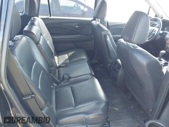 2016 Honda Pilot EX-L with VIN 5FNYF5H57GB023852, listed as a IAAI auction lot 41811412 with 151,707 mi miles and . Bid and sale history available at DreamBid. Image 8.