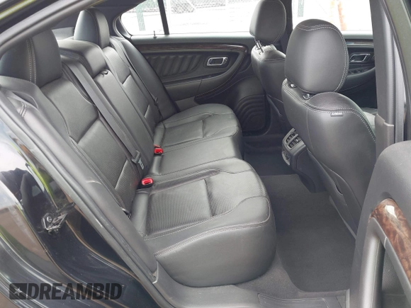 2019 Ford Taurus Limited z VIN 1FAHP2F82KG111088, wystawiony jako IAAI lot #42280384 z przebiegiem 97 961 mil mil oraz . Historia ofert i sprzedaży dostępna na DreamBid. Obrazek 8.