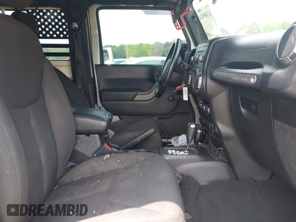 2016 Jeep Wrangler Black Bear with VIN 1C4AJWAG5GL258426, listed as a IAAI auction lot 42400914 with 128,606 mi miles and . Bid and sale history available at DreamBid. Image 5.