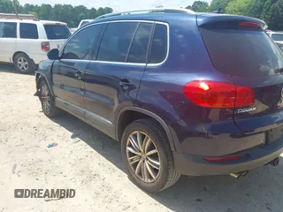 2012 Volkswagen Tiguan SE with VIN WVGAV7AX7CW534703, listed as a IAAI auction lot 42463358 with 119,699 mi miles and . Bid and sale history available at DreamBid. Image 3.