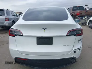 2024 Tesla Model Y Long Range with VIN 7SAYGDEEXRF059620, listed as a IAAI auction lot 42190425 with 16,682 mi miles. Bid and sale history available at carsss.com. Image 16.