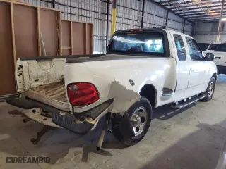 2002 Ford F-150 XL with VIN 2FTRX07242CA99167, listed as a Copart auction lot 88246375 with 0 mi miles and Salvage Title. Bid and sale history available at carsss.com. Image 3.