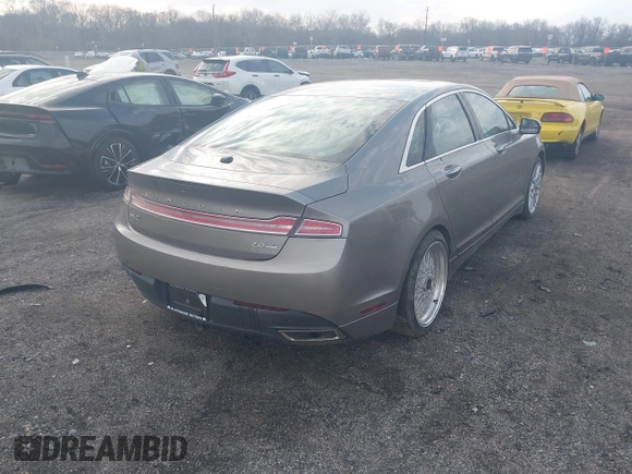 2015 Lincoln MKZ with VIN 3LN6L2J98FR620089, listed as a IAAI auction lot 41805555 with Not provided miles and . Bid and sale history available at DreamBid. Image 4.