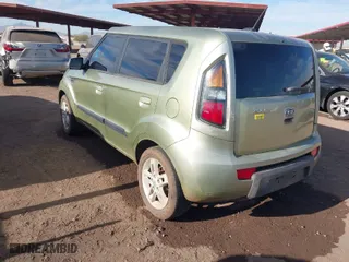 2010 Kia Soul + with VIN KNDJT2A24A7068057, listed as a IAAI auction lot 41464539 with 156,164 mi miles. Bid and sale history available at carsss.com. Image 3.
