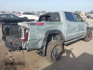 2022 Toyota Tacoma SR with VIN 3TYCZ5AN2NT096491, listed as a IAAI auction lot 42093897 with 47,041 mi miles and . Bid and sale history available at DreamBid. Image 4.