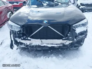 2021 BMW X4 M40i with VIN 5UX2V5C05M9H02711, listed as a IAAI auction lot 41675953 with 26,652 mi miles. Bid and sale history available at carsss.com. Image 6.