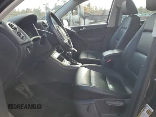 2013 Volkswagen Tiguan SE z VIN WVGBV7AXXDW534779, wystawiony jako Copart lot #77397164 z przebiegiem 149 285 mil mil oraz Szkoda całkowita • Salvage title. Historia ofert i sprzedaży dostępna na DreamBid. Obrazek 7.