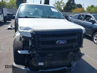 2014 Ford F-150 XL with VIN 1FTMF1CM9EKD53806, listed as a IAAI auction lot 42137550 with 138,888 mi miles and . Bid and sale history available at carsss.com. Image 13.