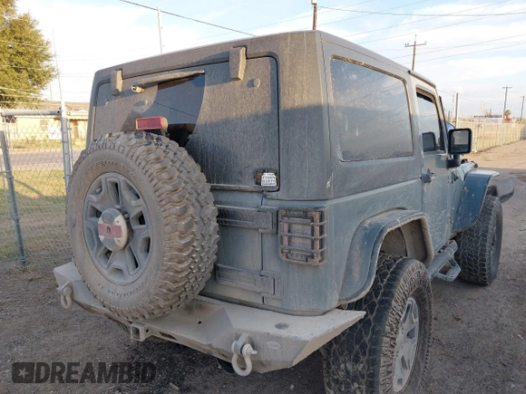 2014 Jeep Wrangler Sport with VIN 1C4AJWAG0EL326774, listed as a IAAI auction lot 41691784 with 98,696 mi miles and . Bid and sale history available at DreamBid. Image 4.