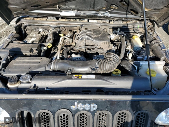 2015 Jeep Wrangler Willys Wheeler with VIN 1C4AJWAG8FL648645, listed as a Copart auction lot 74334884 with Not provided miles and Salvage title. Bid and sale history available at DreamBid. Image 11.