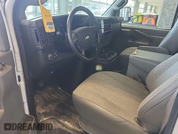 2021 Chevrolet Express Cargo Van with VIN 1GCWGAFP4M1303136, listed as a IAAI auction lot 41990274 with 133,702 mi miles. Bid and sale history available at carsss.com. Image 1.