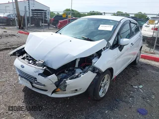 2018 Ford Fiesta SE z VIN 3FADP4EJXJM100407, wystawiony jako IAAI lot #42285374 z przebiegiem 90 261 mil mil oraz . Historia ofert i sprzedaży dostępna na DreamBid. Obrazek 17.