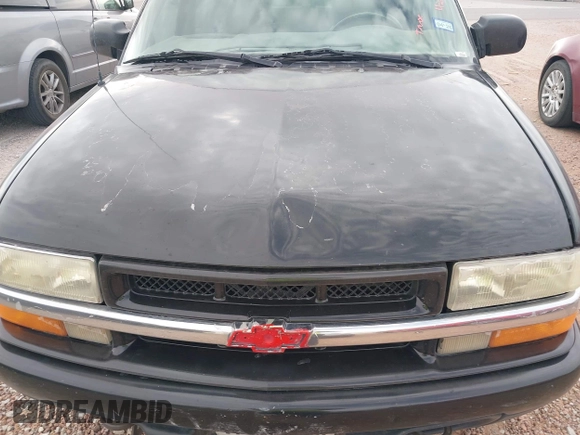 2002 Chevrolet Blazer LS z VIN 1GNDT13W42K124494, wystawiony jako IAAI lot #42266284 z przebiegiem 259 857 mil mil oraz . Historia ofert i sprzedaży dostępna na DreamBid. Obrazek 10.