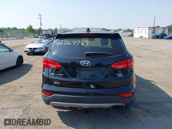 2014 Hyundai Santa Fe with VIN 5XYZUDLB9EG187420, listed as a IAAI auction lot 42369989 with 181,713 mi miles and . Bid and sale history available at DreamBid. Image 17.