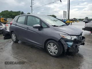 2015 Honda Fit LX с VIN 3HGGK5G59FM731945, выставлен на аукционе Copart как лот 61272285 с пробегом 126 060 миль миль и Списание • Salvage title. История ставок и продаж доступна на DreamBid. Изображение 4.