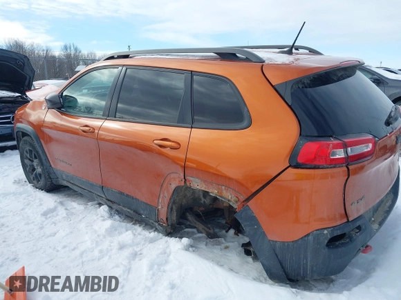 2015 Jeep Cherokee Trailhawk with VIN 1C4PJMBS9FW655233, listed as a IAAI auction lot 41430715 with 138,181 mi miles and . Bid and sale history available at carsss.com. Image 18.