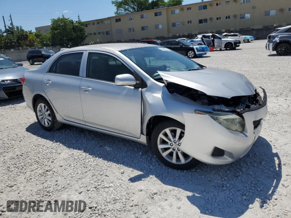 2009 Toyota Corolla with VIN JTDBL40E299062723, listed as a Copart auction lot 52899515 with 183,666 mi miles and Salvage Title. Bid and sale history available at carsss.com. Image 4.