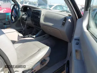 1999 Ford Explorer XLT z VIN 1FMZU32E8XUA34921, wystawiony jako IAAI lot #42162432 z przebiegiem 263 443 mil mil oraz . Historia ofert i sprzedaży dostępna na DreamBid. Obrazek 5.