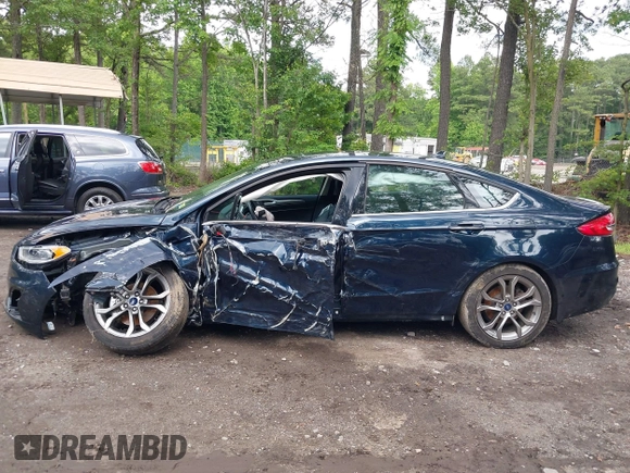 2020 Ford Fusion SEL with VIN 3FA6P0CD1LR180409, listed as a IAAI auction lot 42384311 with 39,163 mi miles and . Bid and sale history available at DreamBid. Image 6.