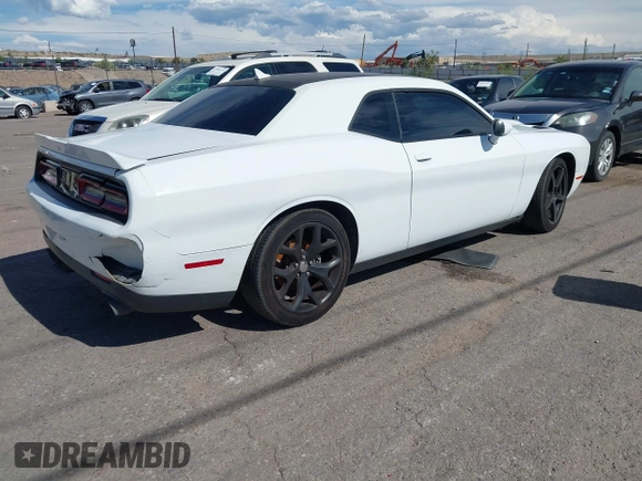 2015 Dodge Challenger SXT Plus with VIN 2C3CDZBG3FH913585, listed as a IAAI auction lot 42609599 with 85,524 mi miles and . Bid and sale history available at DreamBid. Image 4.