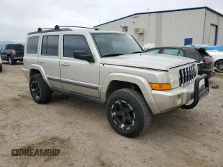 2009 Jeep Commander Sport z VIN 1J8HH48K79C519351, wystawiony jako Copart lot #44996585 z przebiegiem 153 891 mil mil oraz Czysty tytuł • Clean title. Historia ofert i sprzedaży dostępna na DreamBid. Obrazek 4.