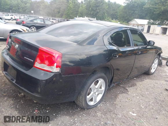 2010 Dodge Charger with VIN 2B3CK4CV0AH238001, listed as a IAAI auction lot 42449286 with 245,934 mi miles and . Bid and sale history available at DreamBid. Image 4.