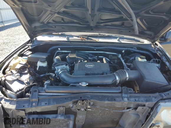 2014 Nissan Xterra S z VIN 5N1AN0NU4EN810738, wystawiony jako Copart lot #75739724 z przebiegiem 140 383 mil mil oraz Szkoda całkowita • Salvage title. Historia ofert i sprzedaży dostępna na DreamBid. Obrazek 12.