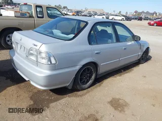 2000 Honda Civic VP with VIN 2HGEJ6616YH581681, listed as a IAAI auction lot 41392947 with 138,022 mi miles. Bid and sale history available at carsss.com. Image 4.