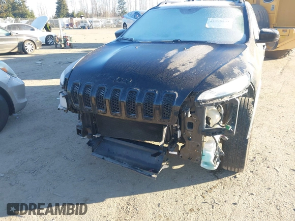 2014 Jeep Cherokee Latitude with VIN 1C4PJMCS7EW286546, listed as a IAAI auction lot 41398331 with 73,650 mi miles and . Bid and sale history available at DreamBid. Image 6.