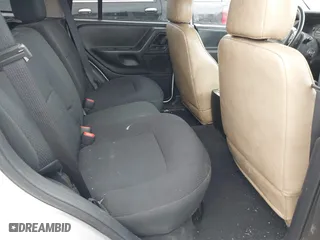 2004 Jeep Grand Cherokee Laredo with VIN 1J4GW48N14C434351, listed as a IAAI auction lot 41860077 with 152,404 mi miles. Bid and sale history available at carsss.com. Image 8.