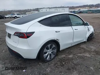 2022 Tesla Model Y Long Range with VIN 7SAYGAEE4NF516625, listed as a IAAI auction lot 41892225 with 33,054 mi miles and . Bid and sale history available at DreamBid. Image 4.