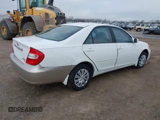 2004 Toyota Camry LE with VIN 4T1BF32K14U067269, listed as a IAAI auction lot 41528507 with 208,346 mi miles. Bid and sale history available at carsss.com. Image 4.