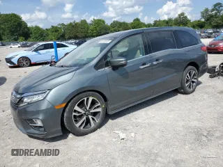 2020 Honda Odyssey Elite with VIN 5FNRL6H9XLB005149, listed as a Copart auction lot 60156095 with 123,373 mi miles and Clean title. Bid and sale history available at DreamBid. Image 1.