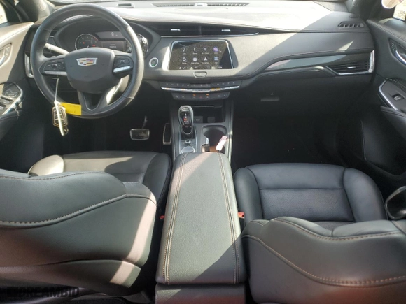 2023 Cadillac XT4 FWD Sport with VIN 1GYFZER42PF102436, listed as a Copart auction lot 84529474 with 33,679 mi miles and Salvage Title. Bid and sale history available at carsss.com. Image 8.