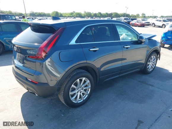 2019 Cadillac XT4 FWD Luxury with VIN 1GYAZAR45KF185338, listed as a IAAI auction lot 41990341 with 69,272 mi miles. Bid and sale history available at carsss.com. Image 4.