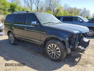 2015 Lincoln Navigator z VIN 5LMJJ2JT2FEJ03107, wystawiony jako Copart lot #56480805 z przebiegiem 176 627 mil mil oraz Czysty tytuł • Clean title. Historia ofert i sprzedaży dostępna na DreamBid. Obrazek 4.