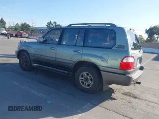 2001 Lexus LX 470 z VIN JTJHT00W113500583, wystawiony jako IAAI lot #42373922 z przebiegiem 269 323 mil mil oraz . Historia ofert i sprzedaży dostępna na DreamBid. Obrazek 3.