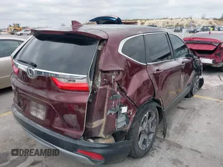 2019 Honda CR-V EX-L with VIN 7FARW1H83KE017311, listed as a IAAI auction lot 41513670 with 87,196 mi miles. Bid and sale history available at carsss.com. Image 4.
