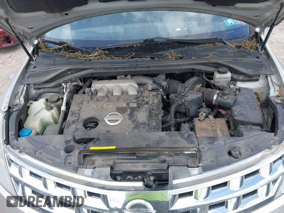 2003 Nissan Murano SE z VIN JN8AZ08W43W214000, wystawiony jako IAAI lot #42274384 z przebiegiem 98 927 mil mil oraz . Historia ofert i sprzedaży dostępna na DreamBid. Obrazek 10.