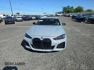 2024 BMW i4 M50 z VIN WBY33AW00RFT04066, wystawiony jako Copart lot #57458105 z przebiegiem 4754 mil mil oraz Szkody całkowita. Historia ofert i sprzedaży dostępna na DreamBid. Obrazek 5.