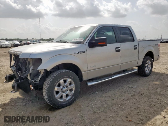 2014 Ford F-150 XL with VIN 1FTFW1ET0EKG04449, listed as a Copart auction lot 62642725 with 223,472 mi miles and Salvage title. Bid and sale history available at DreamBid. Image 1.